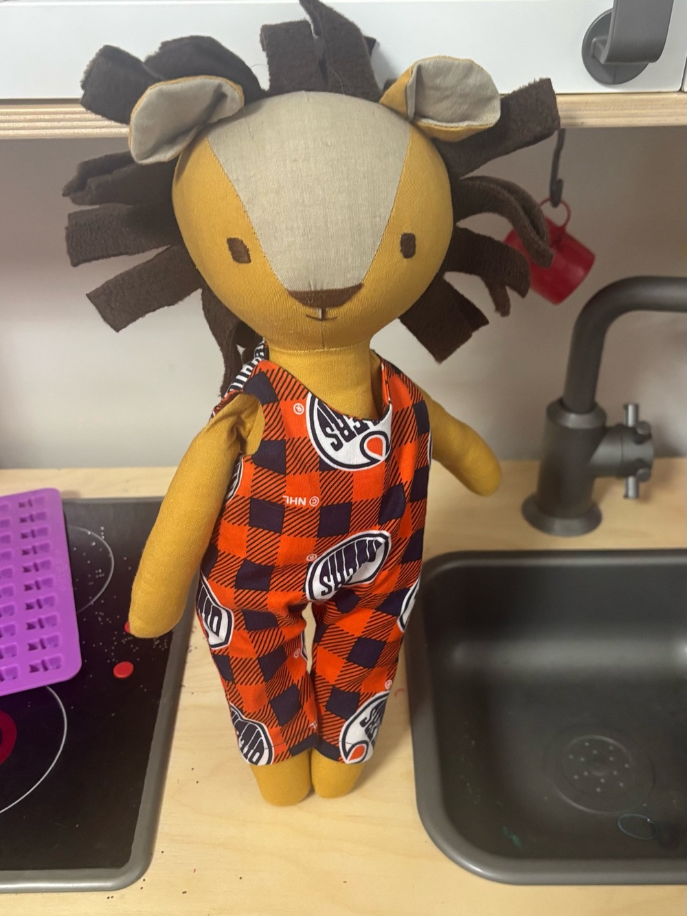 Plush Lion Doll in Mustard Yellow with Oilers Plaid Overalls